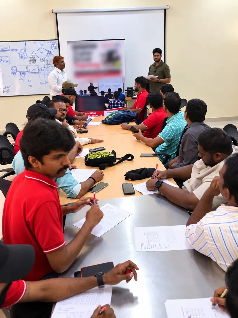 Candidates taking a written module test in the classroom